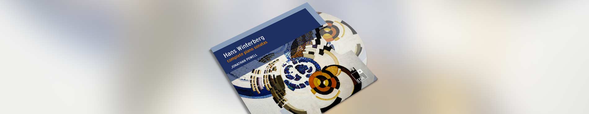 Ein CD-Cover mit abstrakten, bunten Mustern, vermittelt Kreativität und die Freude an Musik.